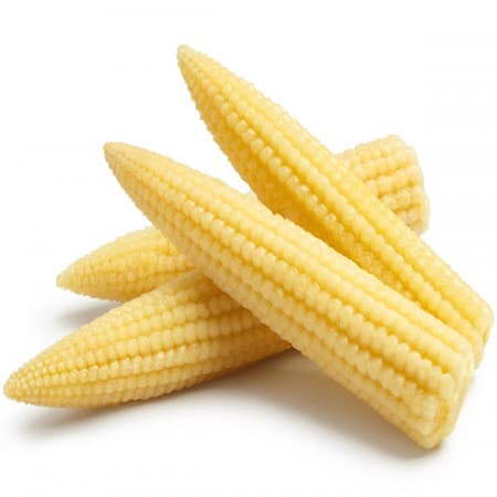 Fresh organic baby corn cobs with tender yellow kernels laid on a wooden tray—perfectly trimmed, clean, and ready for healthy home recipes.