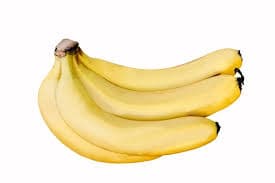 A bunch of ripe organic bananas placed in a handwoven basket, ready to eat or blend.