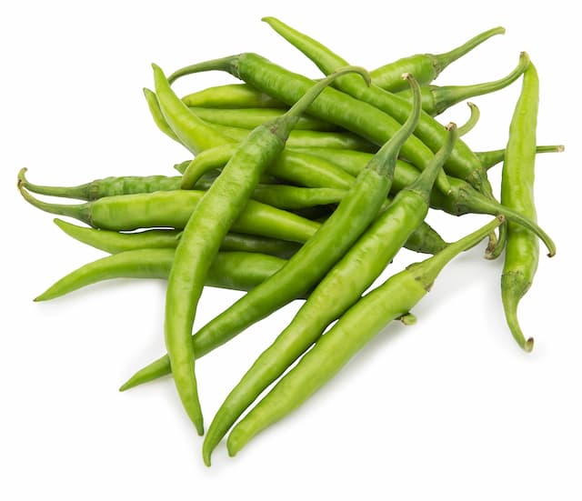 Naturally ripened Mirchi (less spicy), grown in clean soil with no chemicals—taste the difference of organic living.