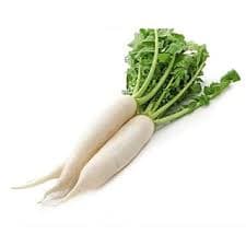Organic white radishes (muli) with green tops laid on a clean surface, fresh and ready for cooking in salads, parathas, or curries.